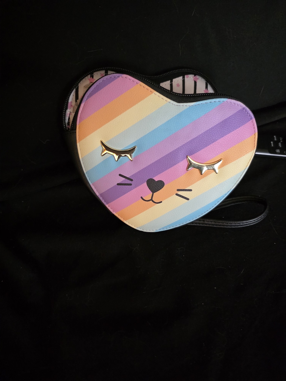 Heart-Shaped Black Wristlet Clutch with Pink Star Lining